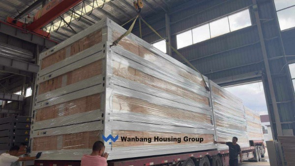 Flat-pack container houses loaded into a 40HQ container