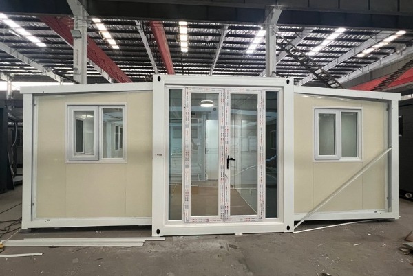 Expandable container house from China expanded on site — shipped as standard box, opens into self-contained living unit